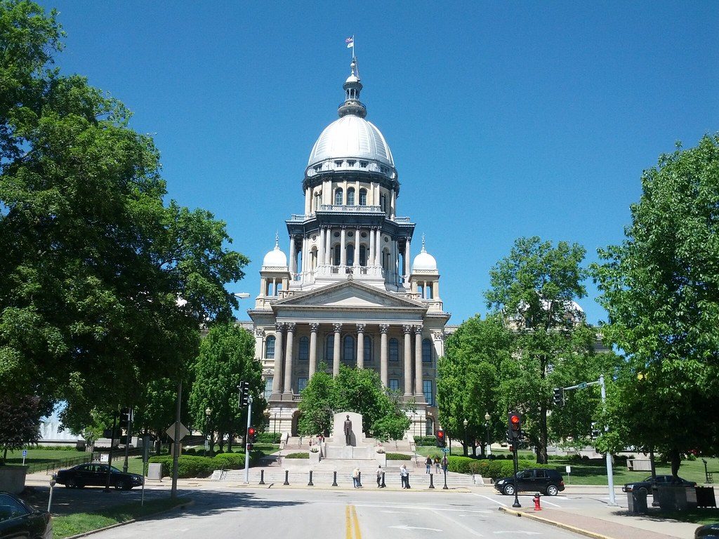 The Illinois State Capitol in Springfield, its silver dome framed by trees